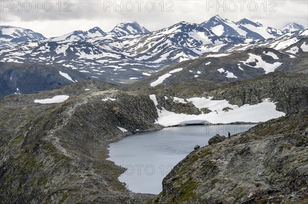 Snowy mountain peaks and lake Bjornboltjonne