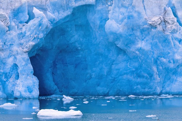 Glacier by the sea with a ice cave in Arctic