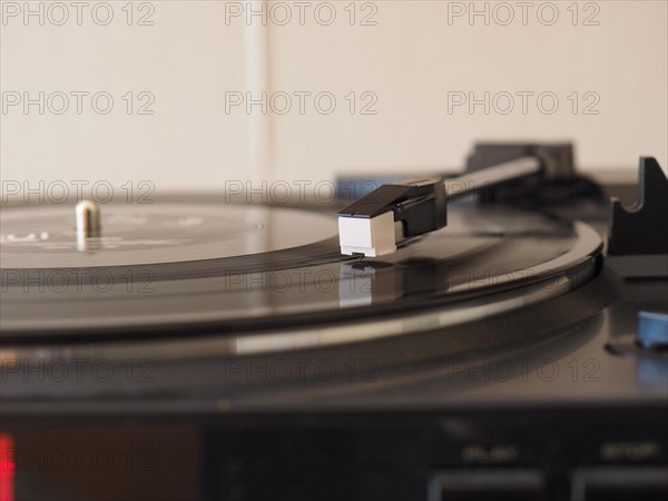 Vinyl record spinning on a turntable