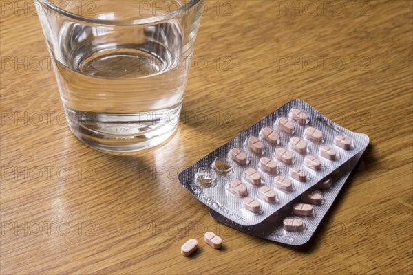 Medicines with a glass of water