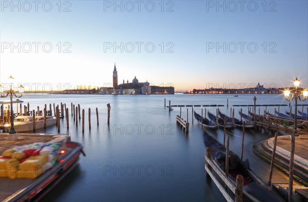 Moored gondolas at the Bacino di San Marco with the church of San Giorgio Maggiore