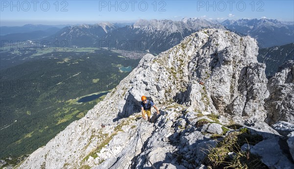 Mountaineer climbing in the rock