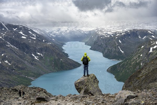 Climber standing on rocks