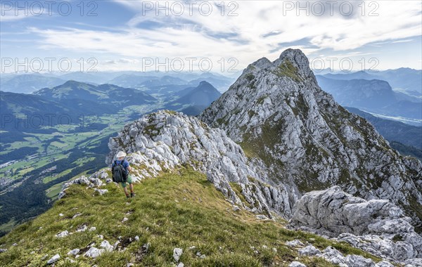 Mountaineer on a ridge path