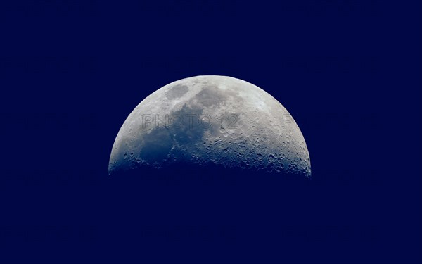 First quarter moon seen with telescope