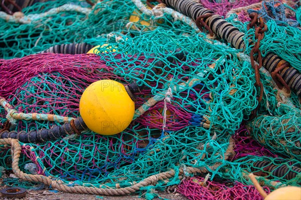 Fishing nets and buoys in the harbour of Guilvinec