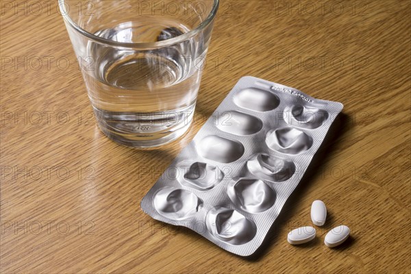 Medicines with a glass of water