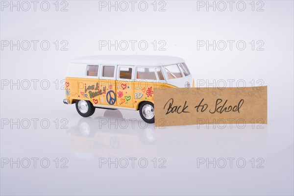 Travel van and back to school title and back to school title on a notebook