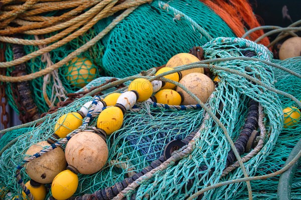 Fishing nets and buoys in the harbour of Guilvinec