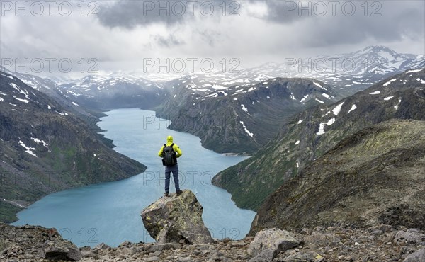 Climber standing on rocks
