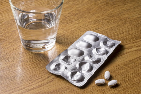 Medicines with a glass of water