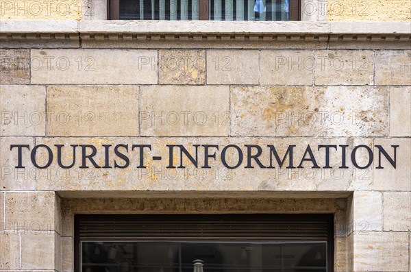 House wall with the letters TOURIST-INFORMATION