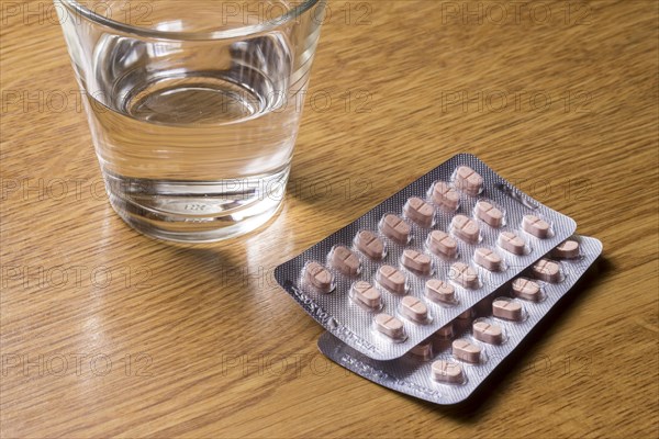 Medicines with a glass of water