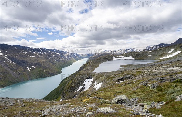 View of lake Gjende with mountains and lake Bjornboltjonne