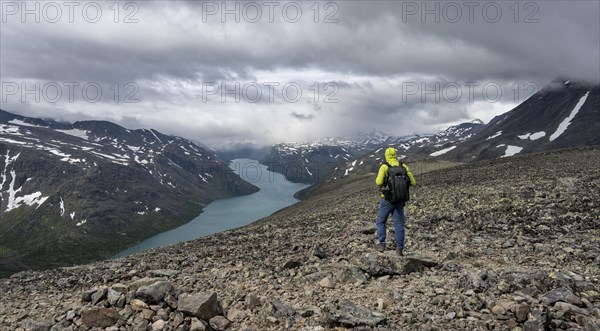 Climbers on stony trail