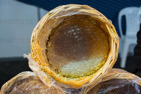 Sweet fresh honey in the sealed comb frame