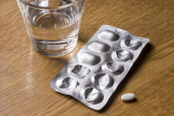 Medicines with a glass of water