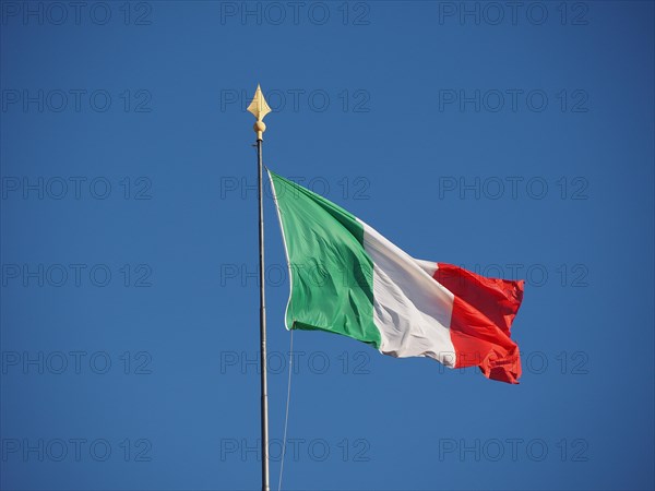 Italian Flag of Italy over blue sky