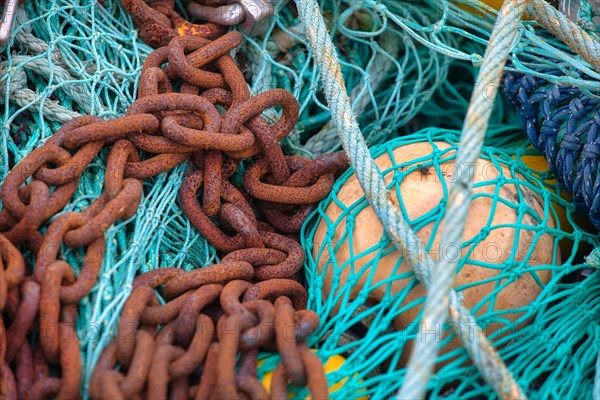 Fishing nets and buoys in the harbour of Guilvinec