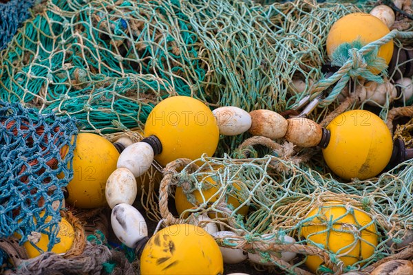 Fishing nets and buoys in the harbour of Guilvinec