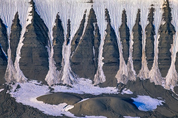 Mountain with natural pattern with snow groove on the mountainside in Arctic