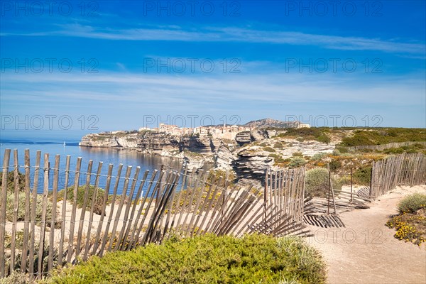 Steep coast of Bonifacio with old town on a limestone plateau