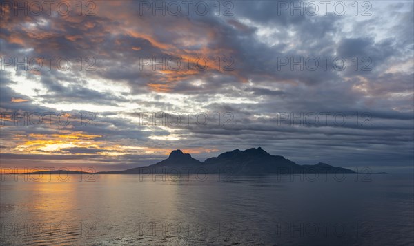 Sea and rocky mountain range