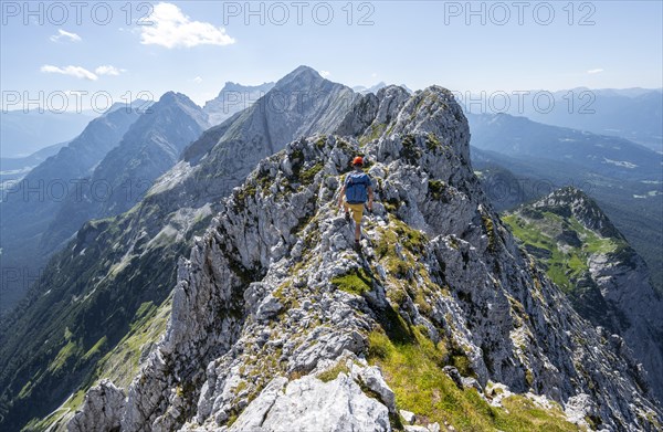 Climbers at the summit of the Upper Wettersteinspitze