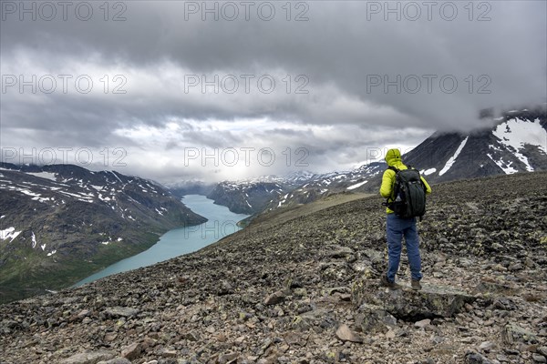 Climbers on stony trail