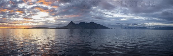 Sea and rocky mountain range