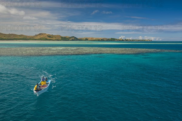 Little boat in the blue lagoon