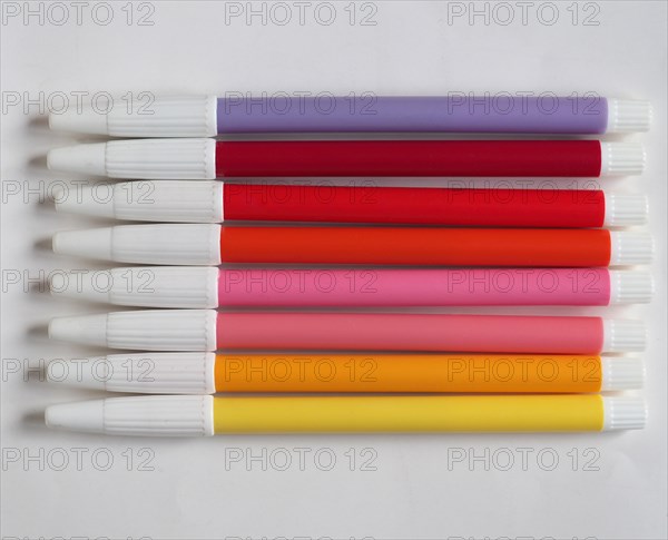 Purple red pink and yellow felt tip pen