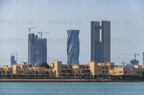 Overlook over the high rise buildings and the United tower in the Kingdom of Bahrain