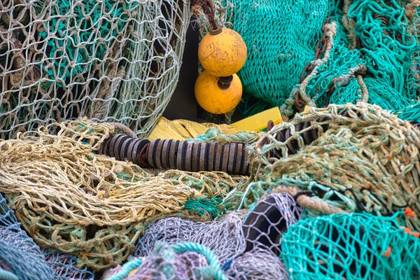 Fishing nets and buoys in the harbour of Guilvinec