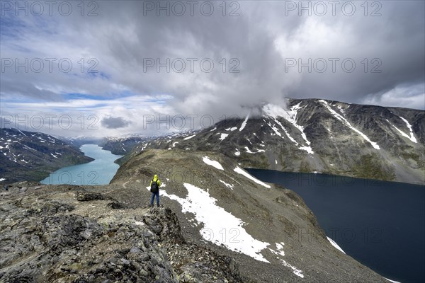 Climbers on stony trail