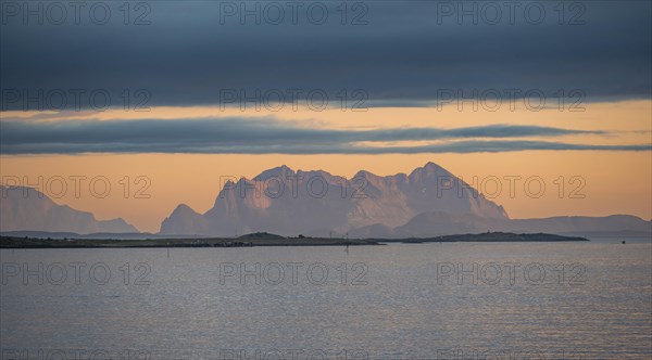 Sea and rocky mountain peaks