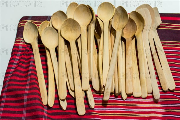 Dozens of soup spoon or tablespoon made of wood