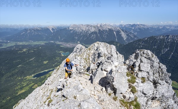 Mountaineer climbing in the rock