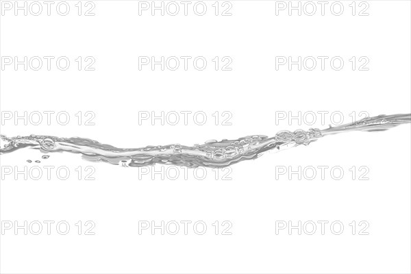 Released sweeping water surface with waves and eddies on a black background