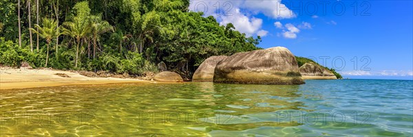 Panoramic image of a deserted and paradisiacal beach on Ilha Grande on the green coast in the south of the state of Rio de Janeiro