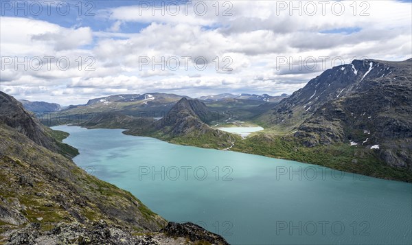 View of Lake Gjende behind Knutshoe Mountain withLake Ovre Leirungen