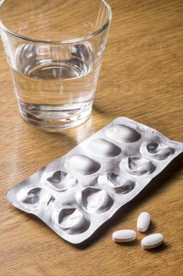 Medicines with a glass of water