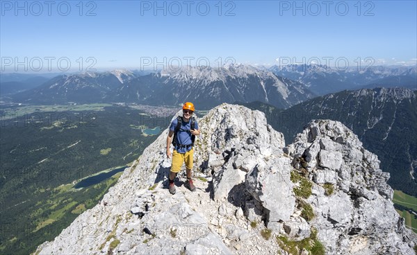 Mountaineer climbing in the rock