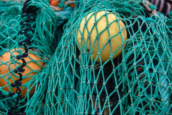 Fishing nets and buoys in the harbour of Guilvinec