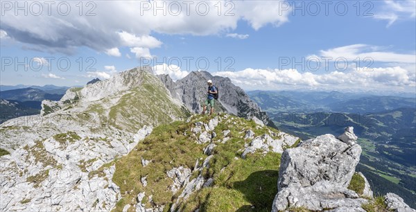 Mountaineer on a ridge trail