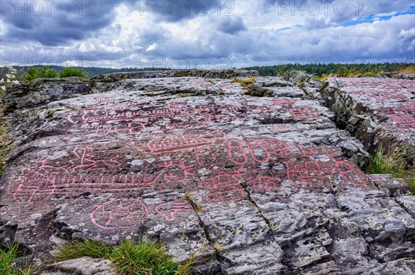 Picturesque view over the landscape and rocks of the Bronze Age rock carvings