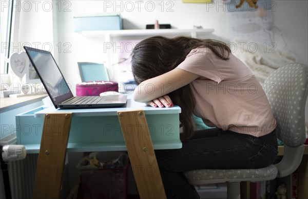 Subject: Girl at a desk