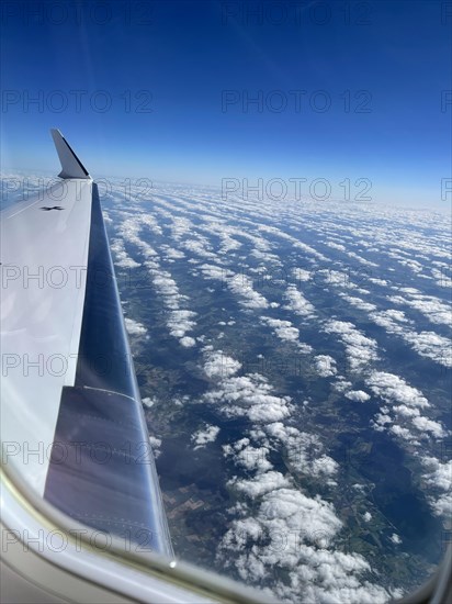 View from a Global 6000 on clouds and landscape in Bavaria