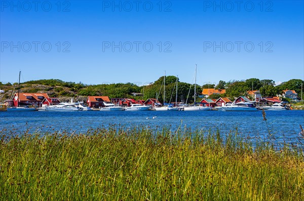 Picturesque coastal landscape with maritime structures and the sound between the islands of South and North Koster