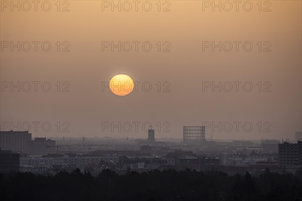 Sunrise over Schoeneberg with the town hall